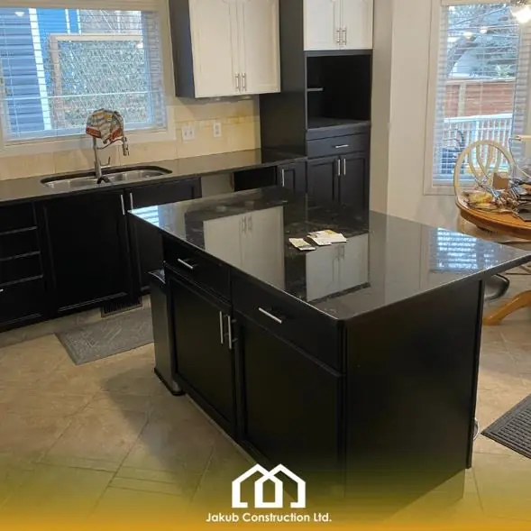 Painted kitchen cabinets in Riverbend Calgary by Jakub Construction